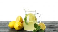 Jara de limonada suíça com limões cortados ao redor